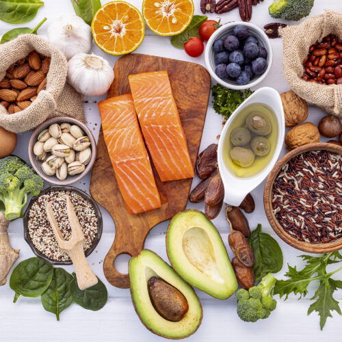 Ingredients for the healthy foods selection on white background. Balanced healthy ingredients of unsaturated fats and fiber for the heart and blood vessels.