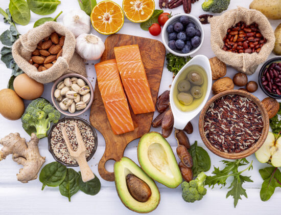 Ingredients for the healthy foods selection on white background. Balanced healthy ingredients of unsaturated fats and fiber for the heart and blood vessels.